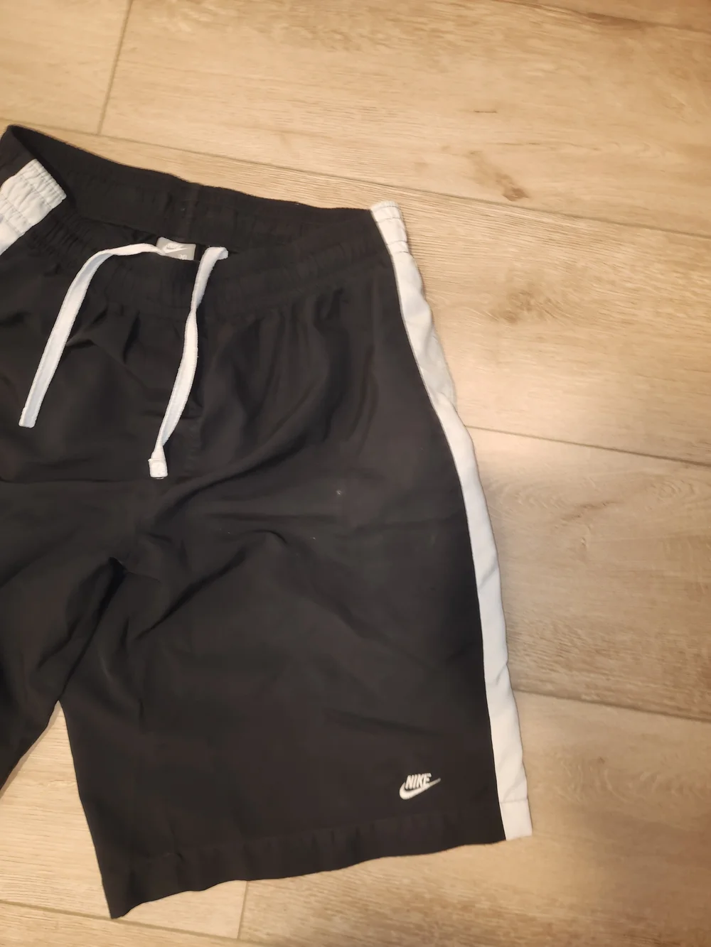 Nike Men's Black Shorts with White Side Stripe